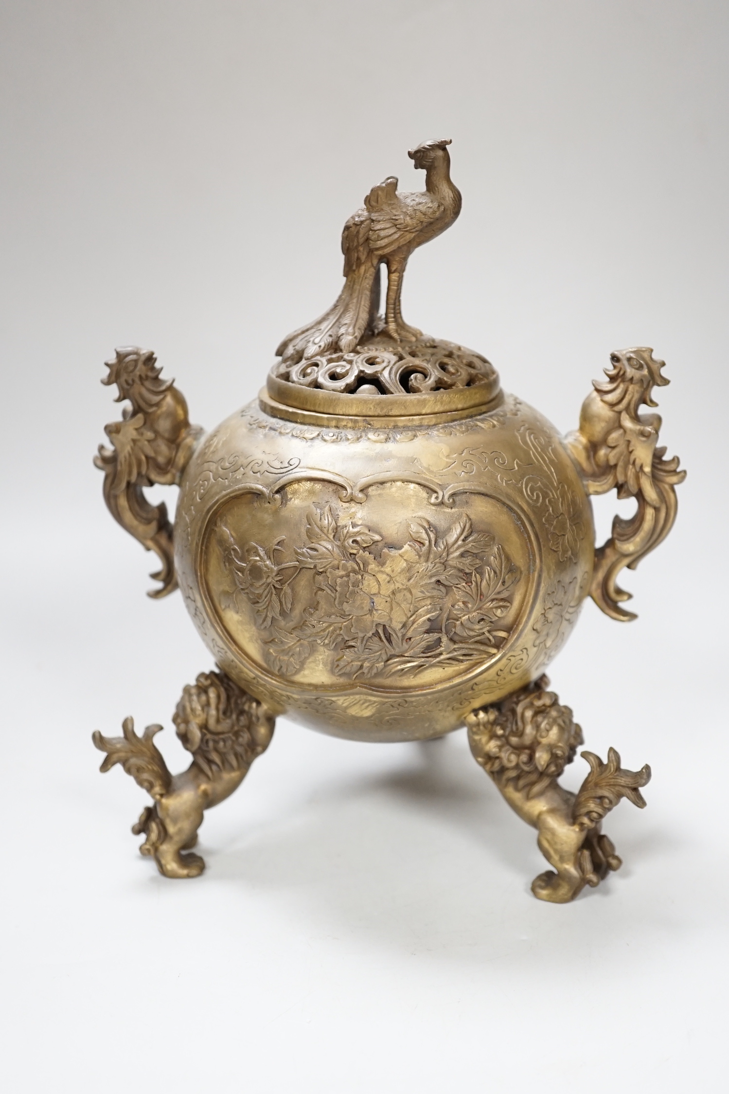 A Japanese bronze shi-shi footed censer and cover, 22cm high